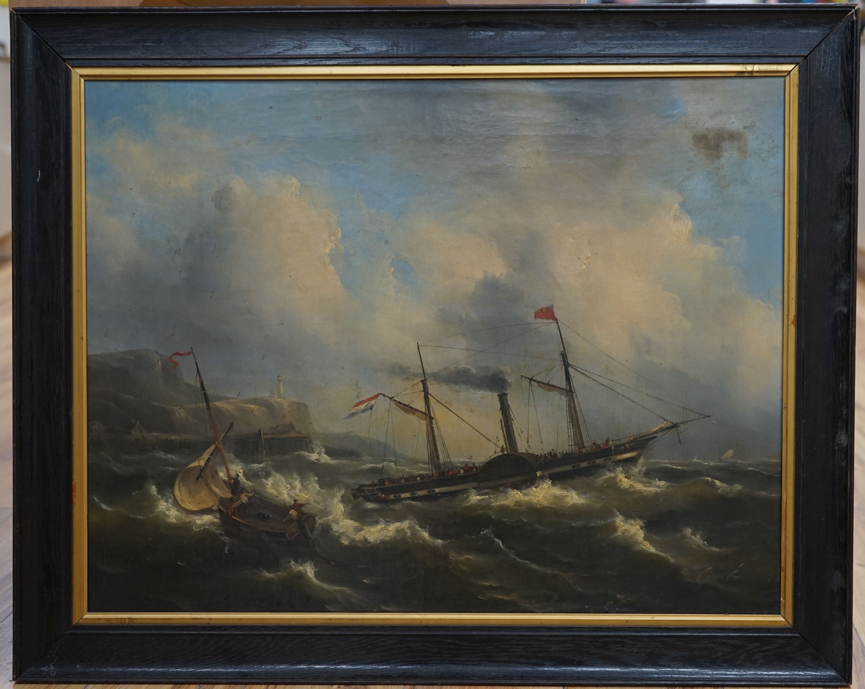 Marine School (19th century), oil on canvas, Dutch paddle steamer and sailing boat in rough seas off the shore, a lighthouse on the cliffs, indistinctly signed and dated, 54 x 70cm